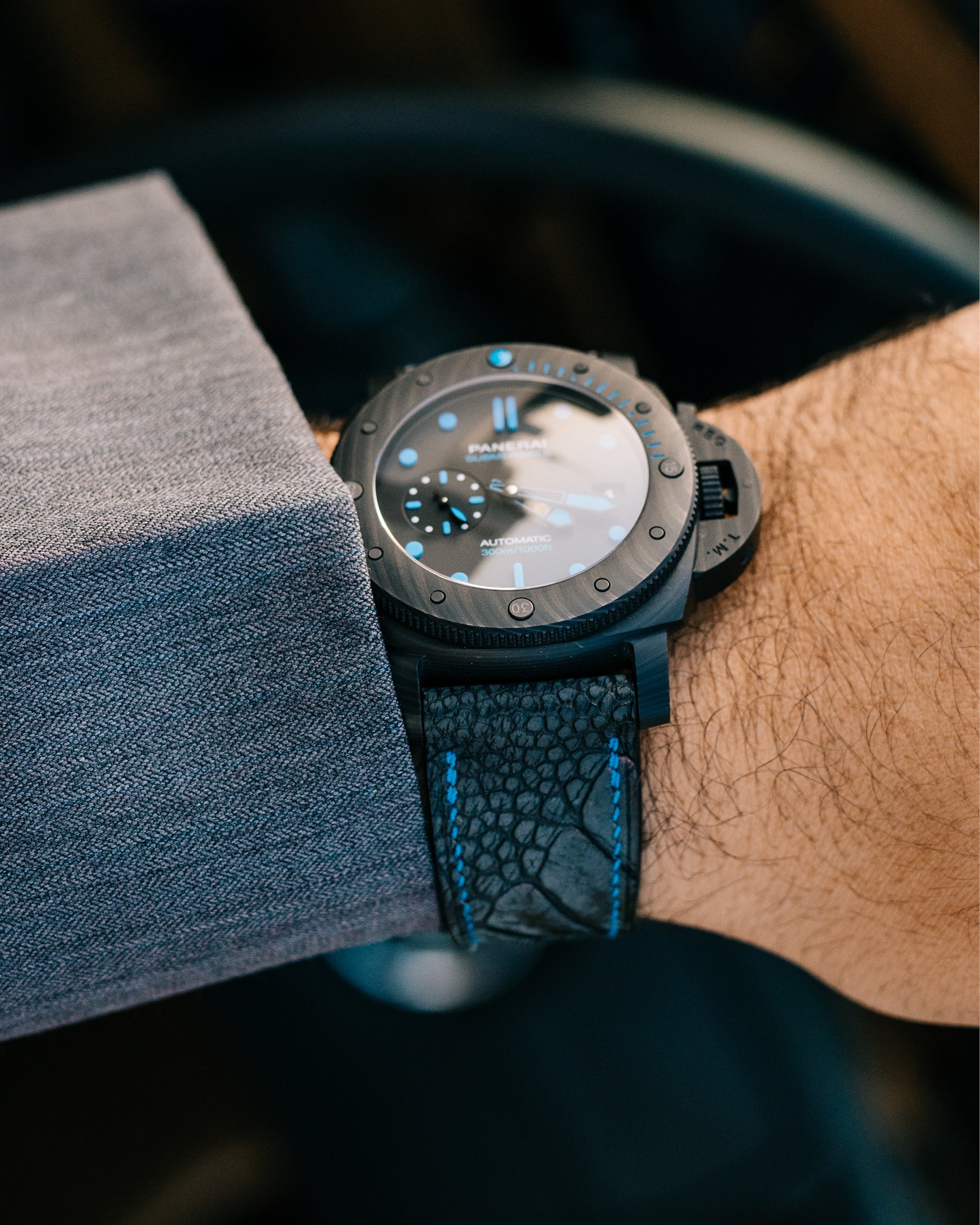 Close up of Black Alligator Panerai Watch Strap with Blue Stitching and Panerai Watch